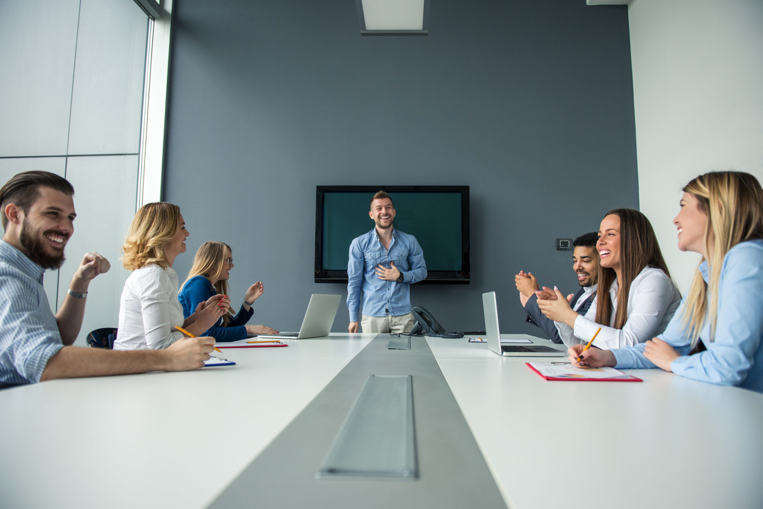 Man presenting to board of directors