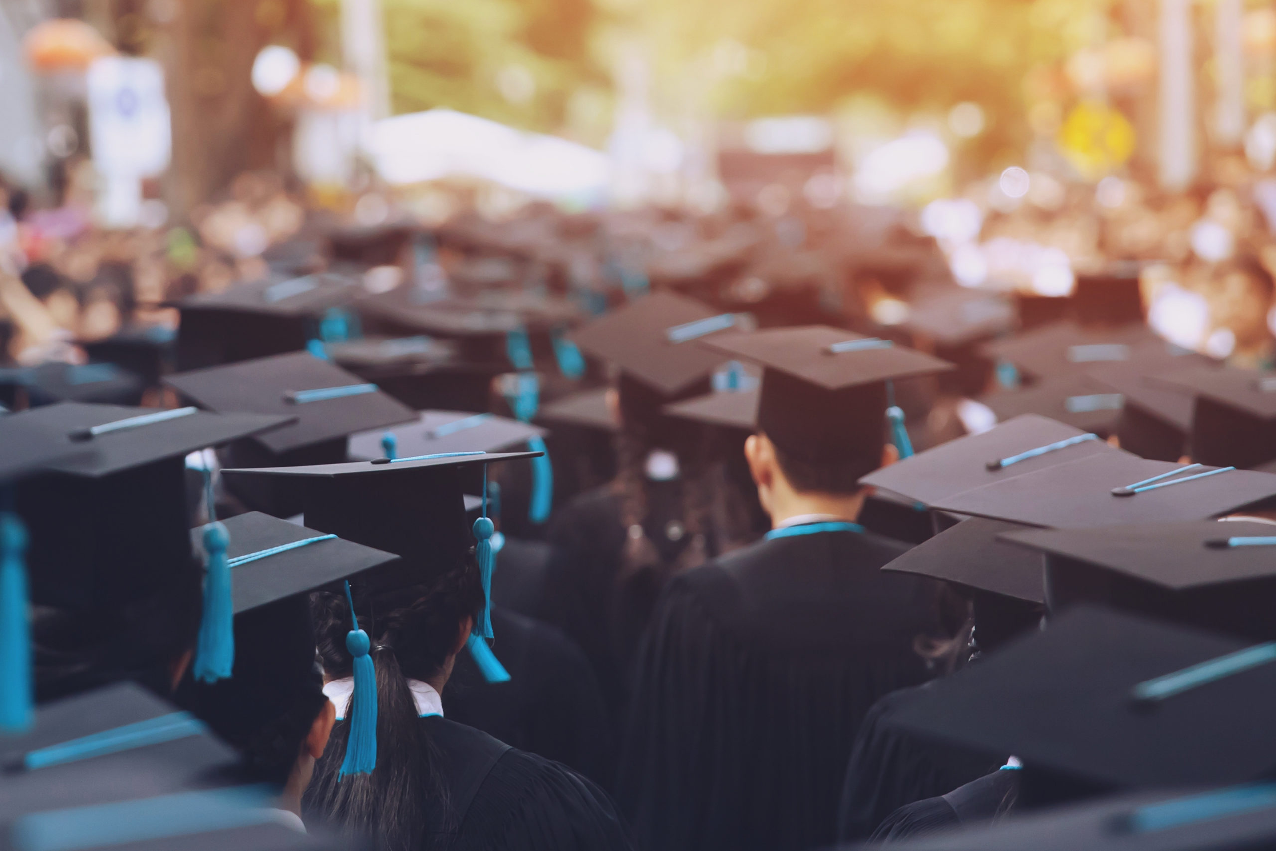 college-ready students graduating high school. Graduation caps